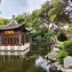 Changle Inn, Yangzhou: traditional pavilion over a tranquil garden pond with stone walkway