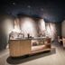 Hotel Belvedere spa lounge in San Genesio Atesino/Jenesien with stone wall, bar counter and seating