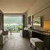 Filario Hotel & Residences in Lezzeno suite with lake view and floor-to-ceiling glass doors