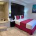 Hotel Del Pescador Ajijic guest room with king bed and built-in soaking tub