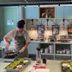 Samsen Street Hotel in Bangkok buffet station with two chefs cooking at a counter
