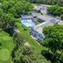 Blue Rock Resort in South Yarmouth with golf course, outdoor pool, and tree-lined grounds