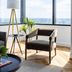 Mint House Dallas Downtown By Kasa corner lounge with floor-to-ceiling windows and skyline view in Dallas