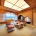 Honjin Hiranoya Kachoan in Takayama: traditional tatami room with low table and mountain view