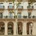Miiro Borneta in Barcelona with arched ground-floor colonnade and wrought-iron balconies