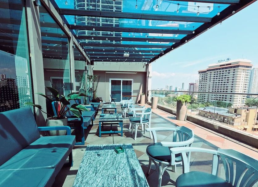 Fairway Colombo rooftop terrace with seating, glass canopy and city views
