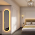 The Clements Hotel, Cambridge guest room with king bed, arched mirror, and tall windows