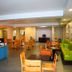 Country Inn & Suites by Radisson, Hagerstown, MD lobby lounge with seating and breakfast area