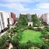 Comfort Hotel Hakata in Fukuoka with a lush green rooftop garden and city skyline views