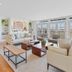 Inn at Playa del Rey in Los Angeles: bright lounge with sofas, armchairs, and large windows overlooking the balcony