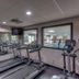Country Inn & Suites by Radisson, Crystal Lake, IL fitness center with treadmills and elliptical machines