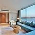 Wonderland Hotel Luxury in Hangzhou guest suite with lake view and floor-to-ceiling windows