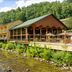 River Terrace Resort & Convention Center in Gatlinburg beside a creek with wooded mountain views