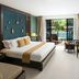 Centara Anda Dhevi Resort & Spa Krabi room with balcony view of pool and tropical greenery in Ao Nang