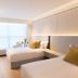 The Bauhinia Hotel - Central Hong Kong twin room with large window seating area