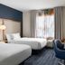 Fairfield Inn & Suites by Marriott Sacramento Airport Natomas guest room with two beds and window seating