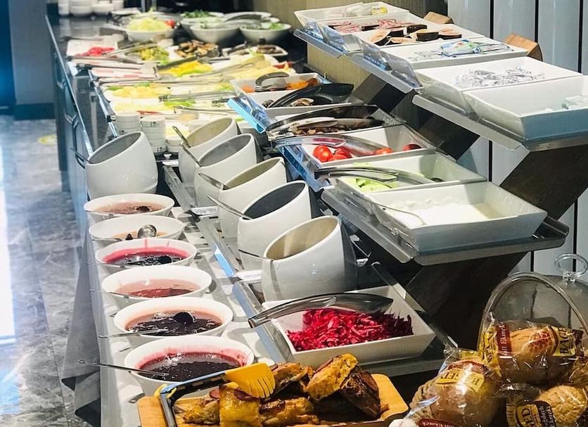 Yeni Bahar Otel Ankara breakfast buffet with assorted fruits, pastries, and hot dishes