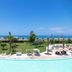 Borgo di Fiuzzi Resort & Spa in Praia a Mare with pool, landscaped garden, and sea view