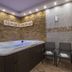 Dom Wypoczynkowy U Staszla in Bańska spa room with indoor hot tub and chairs