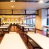 Dormy Inn Premium Kyoto Ekimae Natural Hot Spring dining room with rows of tables and chairs in Kyoto