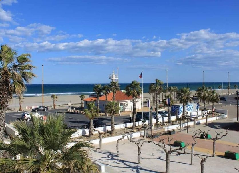 Hotel de la Plage - Barcares in Le Barcarès with sea view, palm trees, and beachfront promenade