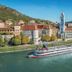 Hotel Schloss Dürnstein in Durnstein overlooking the Danube with river cruise boat and hillside village