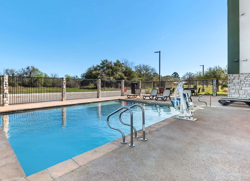 Best Western La Grange Inn & Suites pool with lounge chairs and accessibility lift in La Grange
