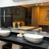 Illusion Xpress I Attraction Hotel Deluxe in Playa del Carmen: bathroom vanity with double sinks and bedroom reflected in mirror
