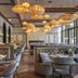 Europäischer Hof in Baden-Baden restaurant with plush seating and warm hanging lanterns