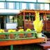 Historic Smith Hotel B&B in Glendale with a colorful courtyard bench and potted plants outside the inn