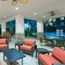 Homewood Suites by Hilton Henderson South Las Vegas covered patio with seating and poolside view