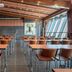 Scandic Rukahovi in Kuusamo dining room with tables, chairs, and large windows