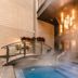Metcalfe Montreal in Montreal: misty indoor pool with bridge, steps, and warm lobby lighting