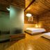 Home++ Xi'an in Xi'an, wooden guest room with two beds and a window