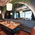 BEST WESTERN Hotel am Europaplatz in Koenigsbrunn restaurant seating with leather chairs and pendant lights