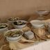 Kosk Sivas buffet table with assorted breakfast dishes and stacked plates in Sivas