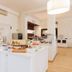 Park Hotel Serena, Rimini: bright breakfast buffet with pastries, fruit, coffee, and white serving counter