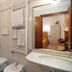 Cà Del Modena bathroom in Venice with shower, sink, toilet, mirror and towel rack