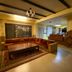 Hotel Siddhi Manakamana Kathmandu lounge with sectional sofa, coffee table, chandelier and reception desk