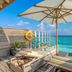 Kagi Maldives Resort & Spa infinity pool terrace with loungers and ocean view in Kagi