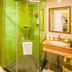 Greentree Inn Ningguo Ningguo Avenue Chengxin Building bathroom with lime-green glass shower and sink, Xuancheng
