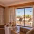 GF Fañabe, Adeje: room with table set for breakfast and balcony sea view