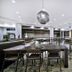 SpringHill Suites by Marriott Phoenix Goodyear lobby lounge with bar, tables and modern seating