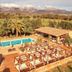 Agroturismo Es Quatre Cantons in Binissalem with outdoor pool, sun loungers, and mountain views