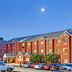 Microtel Inn & Suites by Wyndham Stockbridge/Atlanta I-75 exterior at dusk in Stockbridge