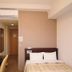 Hotel Route-Inn Utsunomiya Miyukicho room with bed, vanity desk and mirror in Utsunomiya