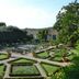 La Certosa di Pontignano in Castelnuovo Berardenga, formal garden with geometric hedges and potted plants