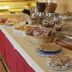 Hotel il Focolare in Fabro breakfast buffet with pastries, cereal dispensers and yogurt