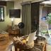 Maui What a Wonderful World Bed & Breakfast room in Kīhei with TV, wicker seating and lanai view