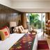 Mandarin Oriental, Sanya bedroom with balcony, tropical garden view, sofa, desk and TV